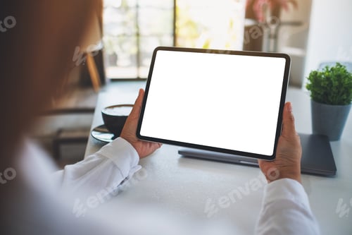 Preview: Mockup image of a woman holding digital tablet with blank white desktop screen