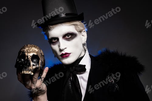 Preview: Young man showcases stunning Halloween costume with dramatic skull accessory