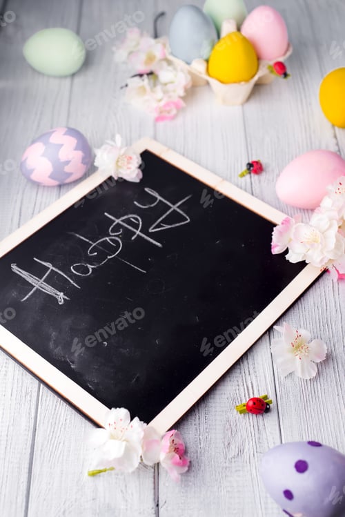 Preview: Easter cake with colored eggs and board for chalk