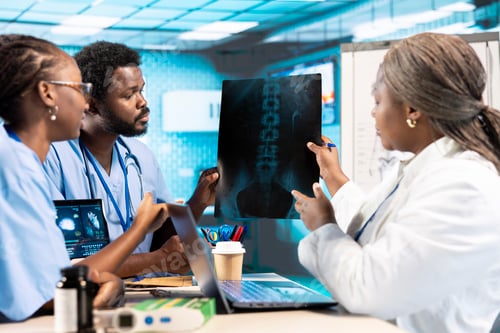 Preview: African american general practitioner leading a healthcare team in a cabinet