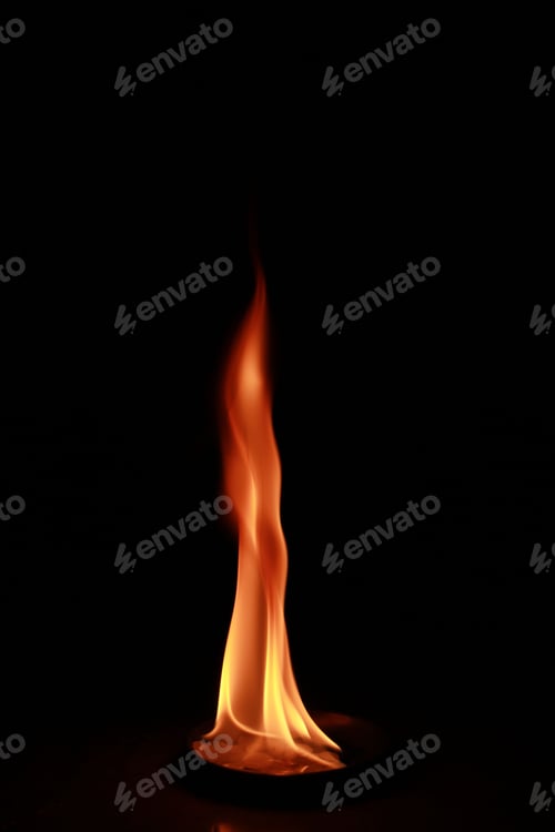 Preview: Vertical shot of flames isolated on a black background for textures