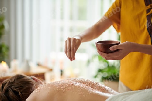 Preview: Esthetician Applying Salt Scrub