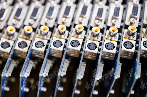 Preview: Close-up blurry metal sockets on a computer video board