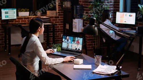 Preview: Businesswoman talking with board of directors on videocall meeting