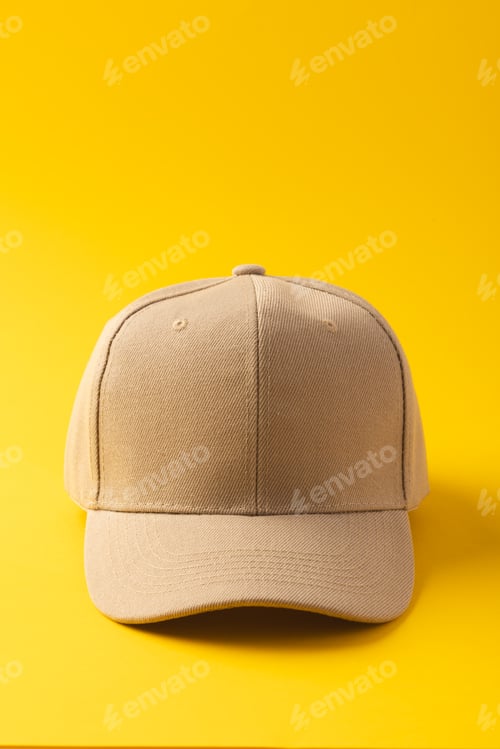 Preview: Cream baseball cap and copy space on yellow background