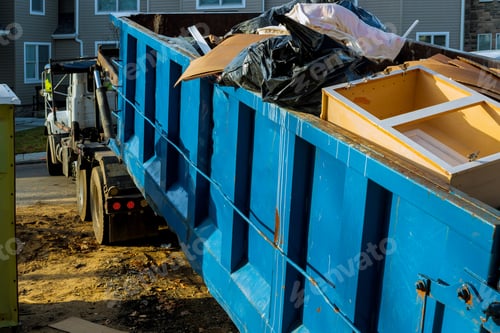 Preview: Dumpster, recycle waste and garbage bins near new construction of appartment houses building