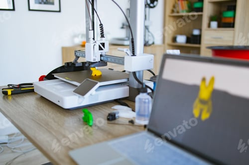 Preview: 3D Printer Creates Colorful Designs on Workspace Desk