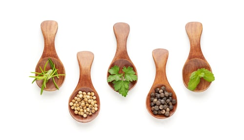 Preview: Set of spoons with different spices and culinary herbs isolated on white background