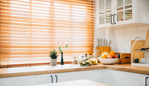 Preview: A modern kitchen boasts wooden furniture and grey design tiles, with a big window and a plant in a