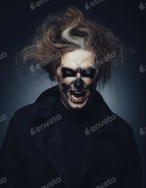 Preview: Skull makeup portrait of young man. Halloween face art.
