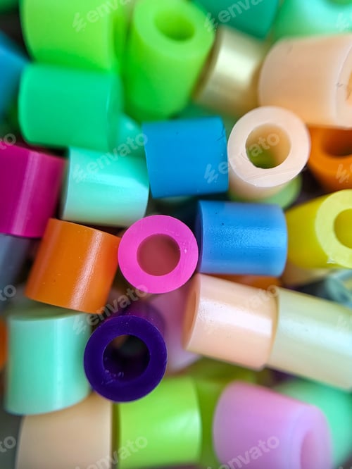 Preview: Bright and colorful. Plastic thermo mosaic close up. Details