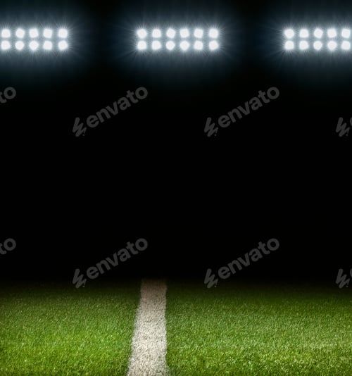 Preview: Grass athletic field with white stripe and dark background below stadium lights