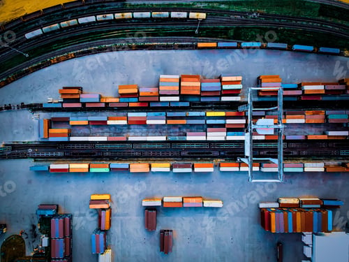 Preview: Top view of colorful freight trains on the railway station