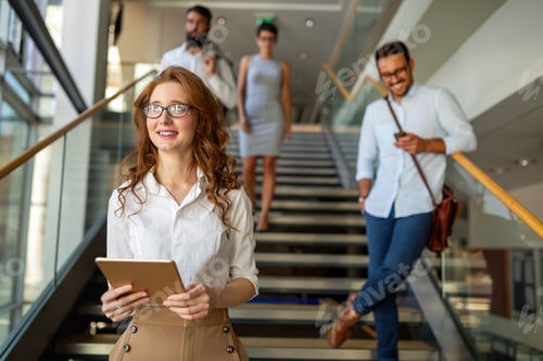 Preview: Collaboration and analysis by business people working together in office