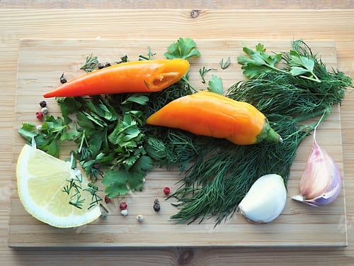 Preview: Colorful Vegetables and Herbs on a Wooden Board