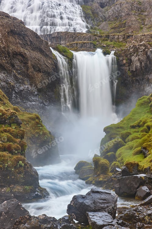 Preview: Picturesqie Fjallfoss waterfall near Dynjandivogur Bay. Icelandic landscape. Iceland