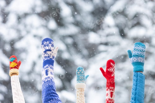 Preview: Human hands wearing Christmas sweater outdoor in winter