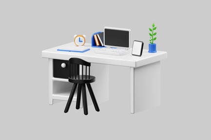 Preview: A desk with a laptop, books, and a plant.