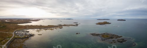 Preview: Aerial panoramic view of a small town on a rocky Atlantic Ocean Coast. Newfoundland, Canada