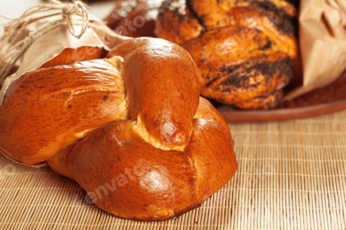 Preview: Freshly baked bread on wooden table