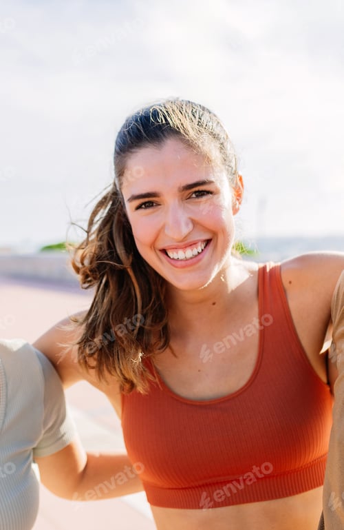 Preview: Smiling Woman in Sportswear Outside on Sunny Day