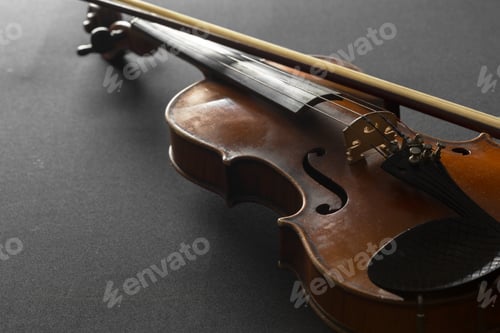 Preview: Old violin on a black background