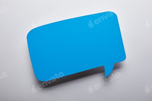 Preview: top view of empty blue speech bubble on grey background