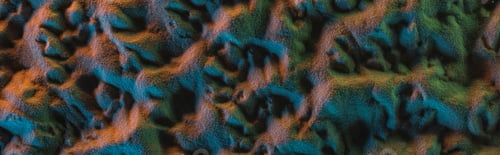 Preview: panoramic shot of textured sand with orange, green and blue lights