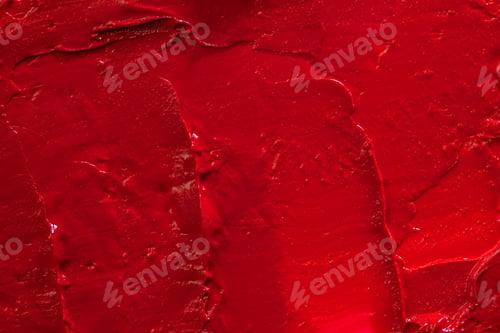 Preview: Red lipstick background texture smudged. Close up