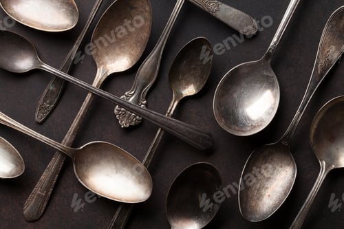 Preview: Old vintage spoons on stone table