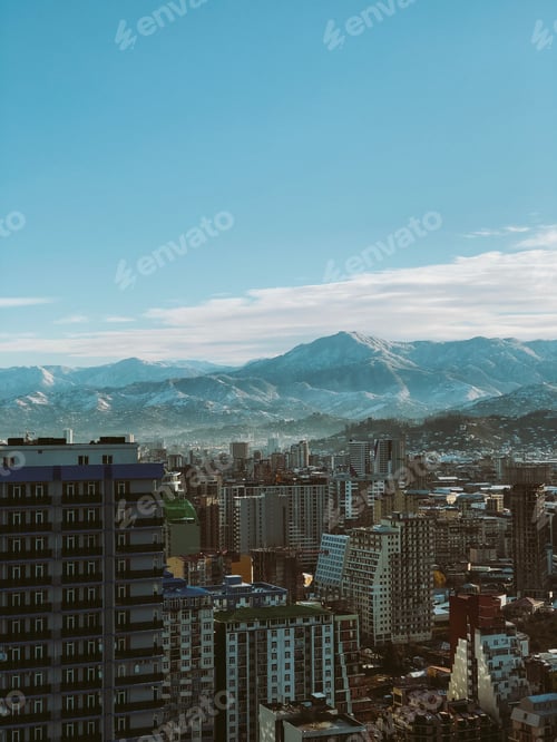 Preview: city view with mountains in the background