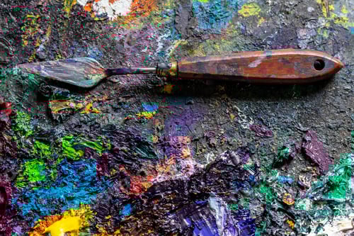 Preview: Close-up of Vivid Paint Palette with Palette Knife