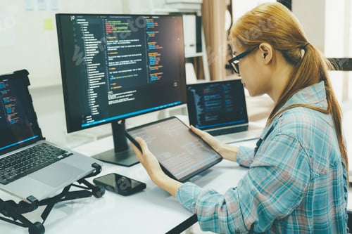 Preview: Programmer is coding and programming software.