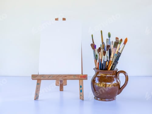 Preview: Blank Canvas and Paintbrushes for Creative Art