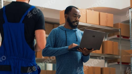 Preview: Warehouse employees doing cargo inventory and shipping stock