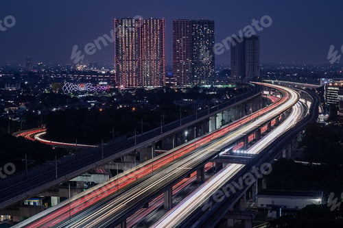 Preview: Drone shot of the long exposures of car light trails entering Jakarta at night, Indonesia