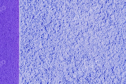 Preview: Beautiful textured plaster background in bright lilac color.