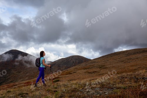 Preview: Caucasian Girl Hiking in the Mountains