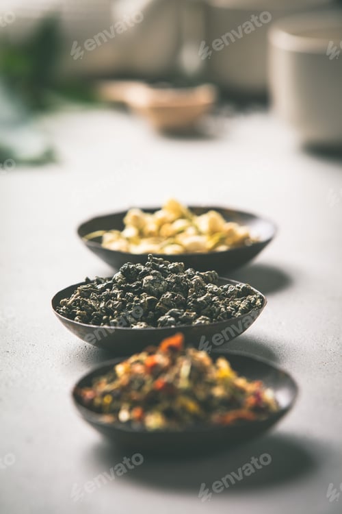 Preview: Tea composition on tropical leaves background
