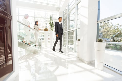 Preview: Young people walking in the office