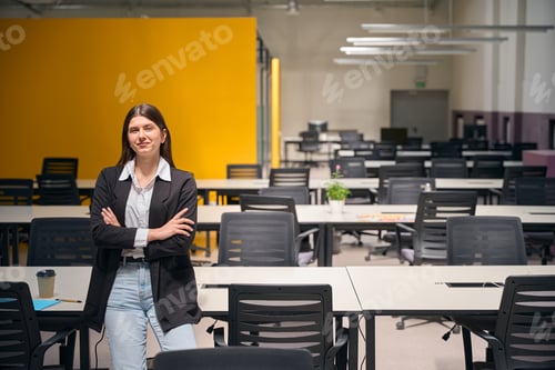 Preview: Girl in a jacket stands near her desk