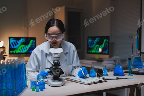 Preview: Female scientist working with microscope evaluating dna research