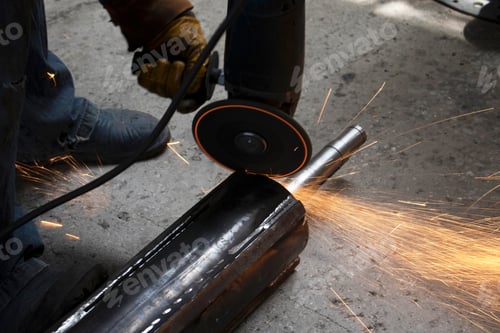 Preview: Metal worker using a grinder