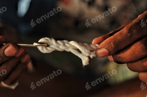 Preview: Fisherman ties intricate knot on fish hook with his skillful hands.
Nominated🙏😍🙏