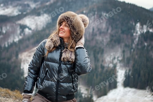 Preview: A young women is enjoying the view of the beautiful mountains. Take a hike, hiking, mountain.