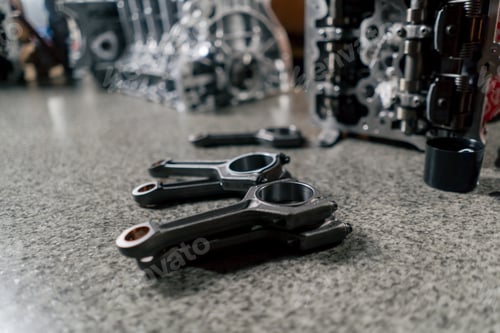 Preview: close up piston and connecting rod on the table disassembled engine repairing an engine