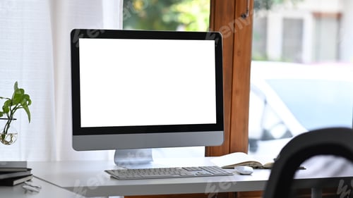 Preview: Mockup computer with empty display on white office desk.