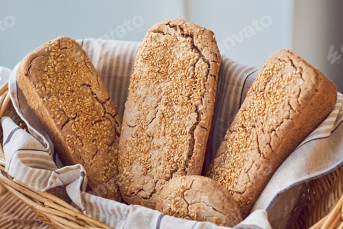 Preview: Appetizing healthy bread with sesame seeds in basket