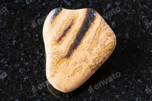 Preview: polished tuff sandstone mineral on on black