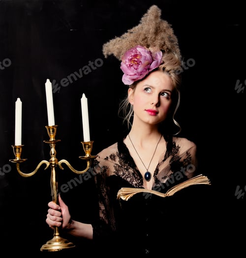 Preview: Beautiful blonde countess with a book and candlestick